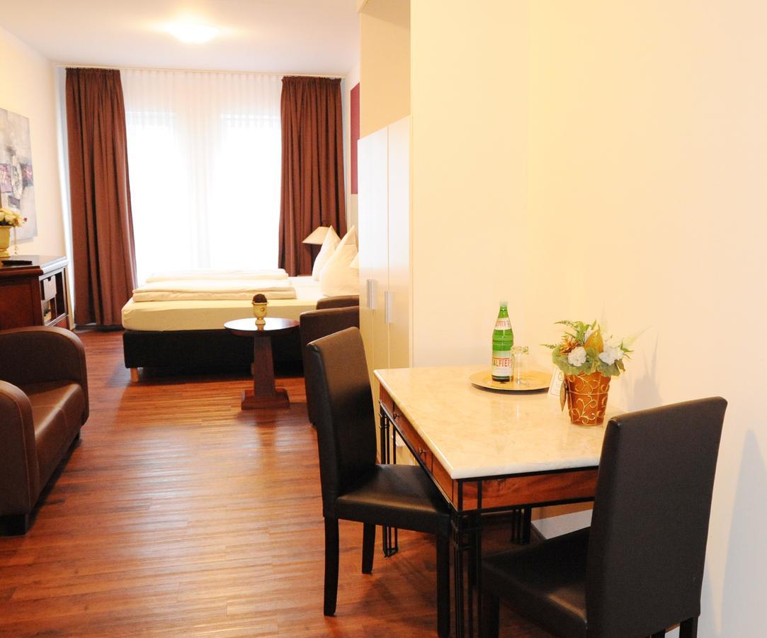 Aparthotel Scheuer ヒュルト エクステリア 写真