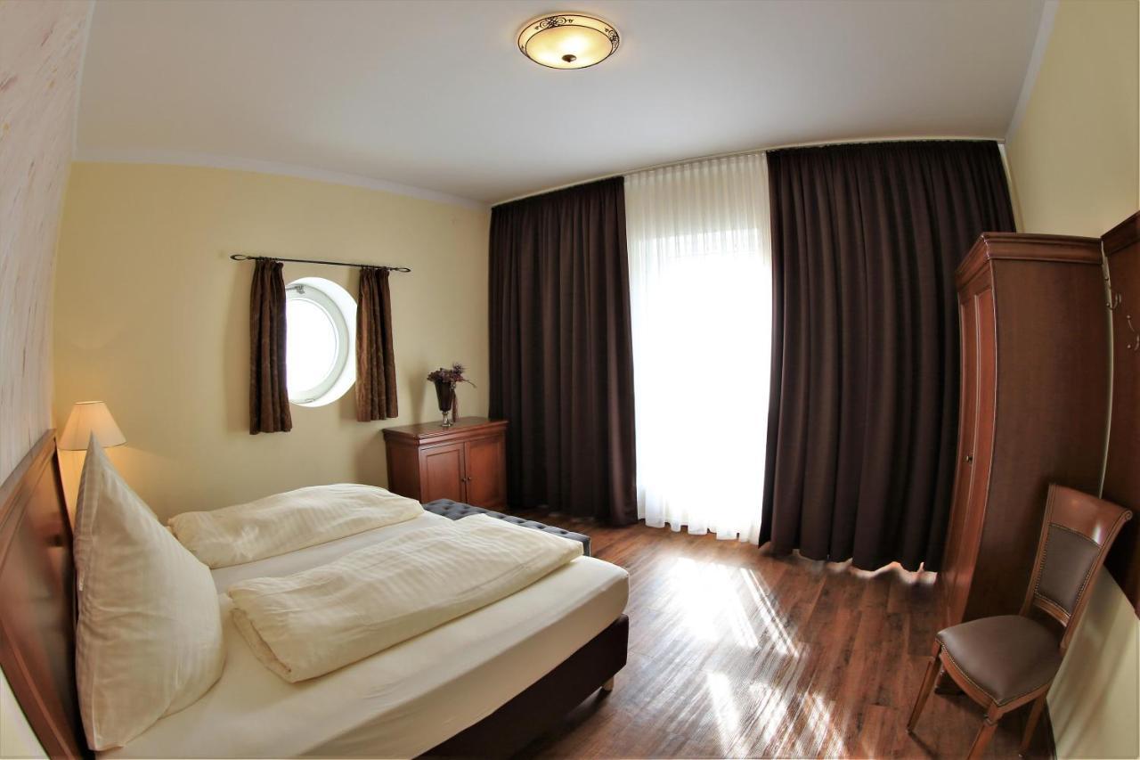 Aparthotel Scheuer ヒュルト エクステリア 写真