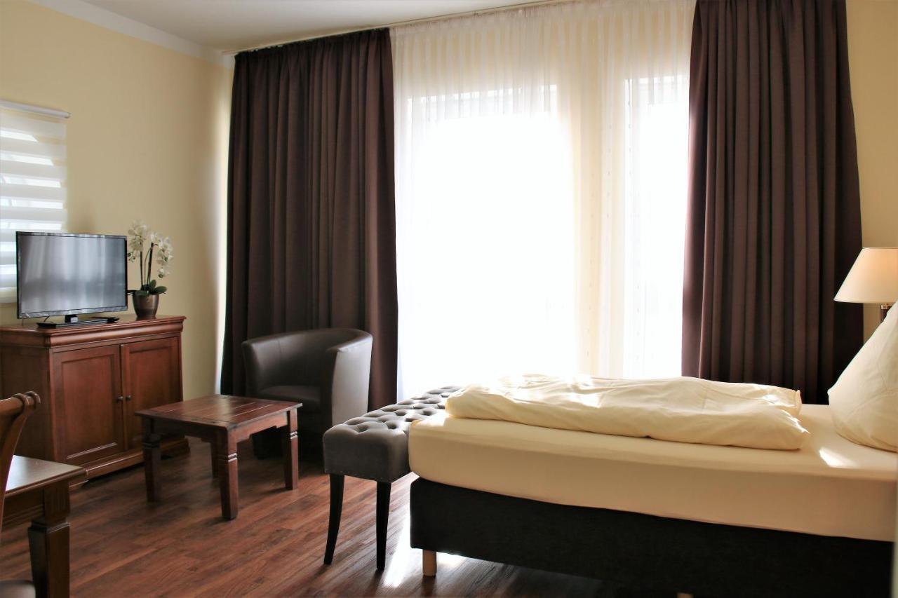 Aparthotel Scheuer ヒュルト エクステリア 写真